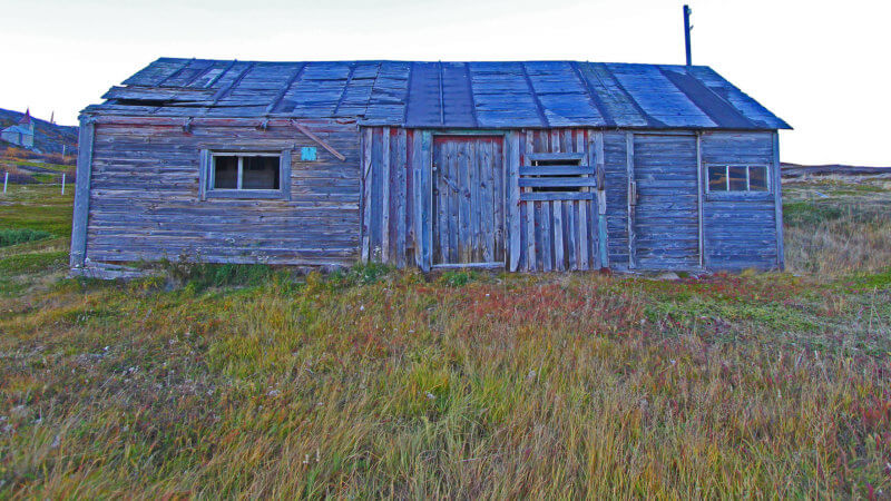 Side shot of an abandoned Norwegian fishing hut.