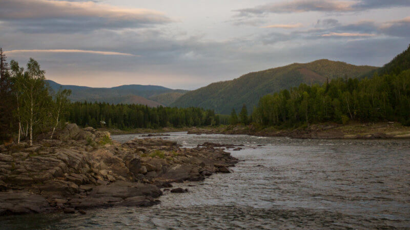 Upper section of the Yenisei River and rapids at dusk.